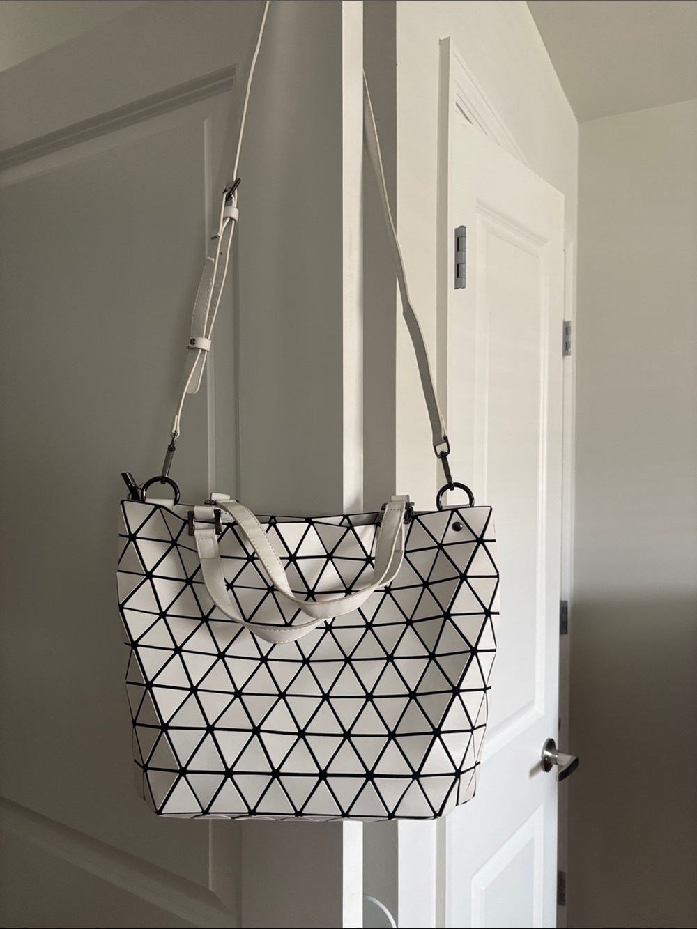 White Geometric Tote Bag with Black Trim and Adjustable Strap
